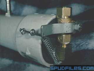 Locked, cocked, and ready to rock. I used a nail to show the simple locking feature since I didn't have a cotter pin on hand. But the idea is clear, attach some string or trip wire to the nail and when it gets pulled out of the levers way, the cannon fires! Simple, clean, and best of all - extremely cost effective! Atom Project once again proves, it's not the size that counts, it's how you work it!