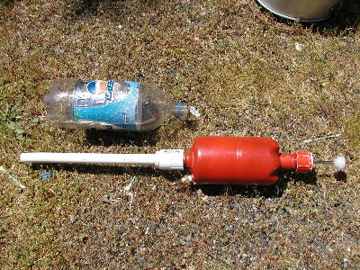 Resized bottle rocket adapter. The 2 liter bottle filled partway with water fits on and gets a shot of air.  Messy, refreshing and fun.  Oh, resized with the Gimp to fit here.