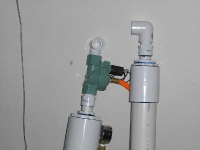 Step Sixteen<br />thread youre elbows into the barrel and valve then glue a piece of 1&amp;quot; pipe between them