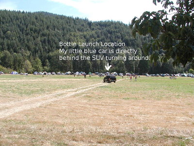 My little blue car is there in the line of cars past the baseball game.  Photo is taken in the shade of the target tree.