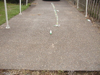 Barrel test 2.  Sorry I forgot to put it in the picture.  This one blasted a bottle into the air and over several bottles and knocked one over in the back.  This barrel is my red 1-1/4 inch marshmallow barrel.