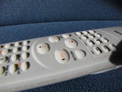 This image has a lot of noise. Look at the static likeness around the buttons and in the shadows.