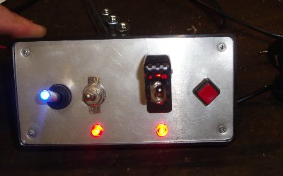 Switch box.  The switches are as follows:<br /><br />Main Power (with the blue LED), Chamber Fans, Arm switch (with cover), and Fire button.