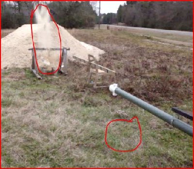 I have circled the patch of grass behind the muzzle that is being blown down.  You can really tell in the video when you advance the frame forward and backward.  (I also have the exploding paint can circled)