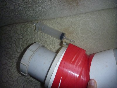 gas cylinder out of a barbecue lighter taped on for portability