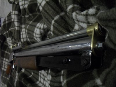 Hard to see the brace between the end of the mag and the barrel....because it is polished and reflects light...