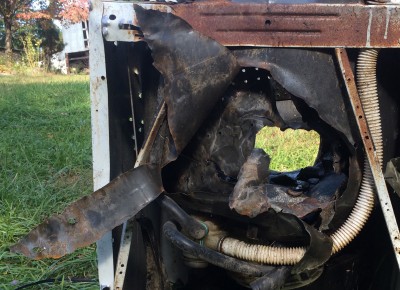 Here is the exit side of the washer.  Old one so thick steel drum, it also hit the spindle in the middle tearing it out. The projectile entered sideways.