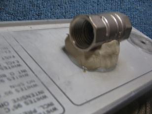 This is attached with putty and adhesive.