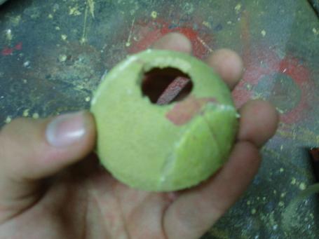 The bumper,made from a half section of a tennis ball wiht the fur removed and a hole in the centre for venting.