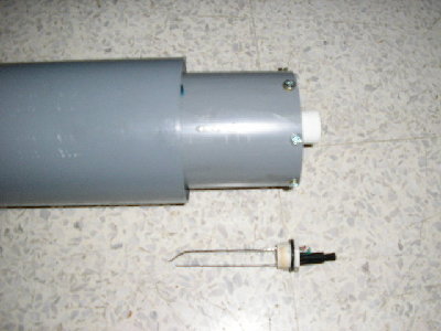 Piezo ignitor taken from a cigarette lighter, epoxied to threaded fitting for ease of maintenance and venting