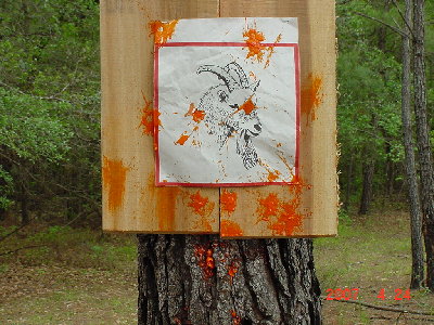 DSC00222.JPG (346.12 KiB) Viewed 6123 times spead pattern of my 24 rd. shotgun load(I accidently aimed a little low)