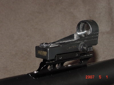 the sight rail and red dot sight