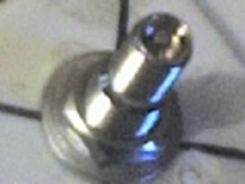 This is the top were the nut tightens it down