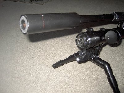 A closeup of the barrel, pressure gauge and lasersight/flashlight assembly. If you look closely you can see the copper pipe inside of the pvc.