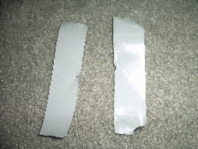 And put duck tape on either side of the disk and put it on one end of the main body and fold over the remaining tape onto the main body. Then take a strip of duck tape and cut it lengthwise.