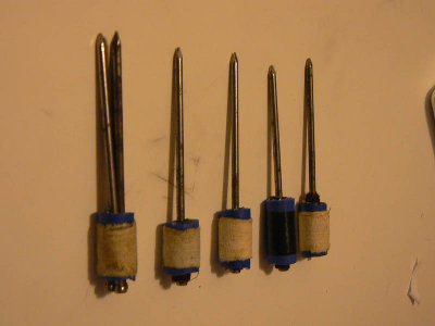 The four darts at the right are regular darts, and accurate up to 30ft, as that is the maximum distance I can test. <br />The Dart on the left contains three nails, and these nails impart spin on the projectile.