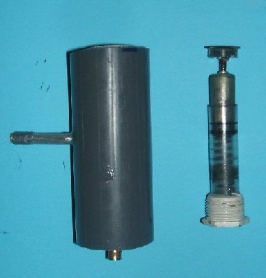 floating piston unit assembled in cylinder and chamber.